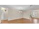 Bright living room with wood flooring and access to the outdoors at 9433 Stonewall Ln, New Port Richey, FL 34655