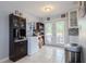 Cozy kitchen area with modern appliances, storage cabinets and easy access to an outdoor patio at 9635 Century Dr, Spring Hill, FL 34608