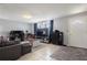 Spacious living room features tile floors, bright colors and ample natural light at 9635 Century Dr, Spring Hill, FL 34608