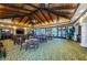 Spacious dining area with wood-paneled ceilings and glass doors at 9704 Milano Dr, Trinity, FL 34655