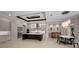 Spacious kitchen with stainless steel appliances, large center island, and modern lighting fixtures at 9704 Milano Dr, Trinity, FL 34655