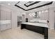 Contemporary kitchen boasts custom cabinets, stainless steel appliances, and a large center island at 9704 Milano Dr, Trinity, FL 34655