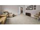 Spacious living room with neutral carpet and furniture at 9704 Milano Dr, Trinity, FL 34655