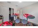 Bedroom featuring wood-look flooring, closet and doorway providing versatile living space at 9706 Simeon Dr, Land O Lakes, FL 34638