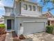 Two-story home with gray exterior paint and a manicured front yard at 9706 Simeon Dr, Land O Lakes, FL 34638