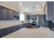 Well-equipped kitchen featuring modern appliances and white countertops at 9706 Simeon Dr, Land O Lakes, FL 34638