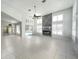 Bright living room features tile floors, fireplace, shutters, and sliding glass doors leading to the pool at 10060 Chip Ln, New Port Richey, FL 34654