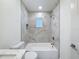 Bathroom featuring a tiled tub/shower combination and modern fixtures at 10097 Weatherly Rd, Brooksville, FL 34601