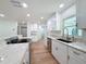 This pristine kitchen boasts granite countertops, stainless steel appliances and a functional layout at 10097 Weatherly Rd, Brooksville, FL 34601
