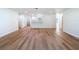 Spacious living room with wood flooring and natural light at 10097 Weatherly Rd, Brooksville, FL 34601
