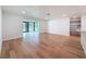 Open floor plan features light wood floors and access to pantry at 10097 Weatherly Rd, Brooksville, FL 34601