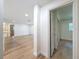 Bright and spacious living room featuring hardwood floors with an open doorway at 10097 Weatherly Rd, Brooksville, FL 34601