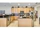 Well-equipped kitchen with stainless steel appliances, granite countertops, and ample cabinet space at 11204 Biddeford Pl, New Port Richey, FL 34654