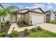 Charming single-story home with a well-maintained front yard and attached garage in a desirable neighborhood at 11395 Lavender Loop, Spring Hill, FL 34609