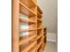 Bright walk-in closet with custom built-in shelving, providing ample storage and organization solutions at 11418 Tee Time Cir, New Port Richey, FL 34654