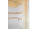 Clean shower and bathtub with a tiled surround, showcasing easy maintenance at 13027 Beacon Ct, Hudson, FL 34667