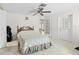 This spacious bedroom features a fan and natural light from a nearby door at 13180 Montour St, Brooksville, FL 34613