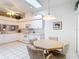 Kitchen features a breakfast nook, ample counter space, and modern appliances at 13321 Norman Cir, Hudson, FL 34669