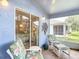 Inviting patio furnished with comfortable seating and scenic views of the garden at 13321 Norman Cir, Hudson, FL 34669