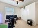 Bedroom featuring a gaming chair and computer accessories, ceiling fan and window with blinds at 14655 Potterton Cir, Hudson, FL 34667