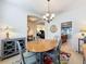 Bright dining room with archway views to the living room and kitchen at 14655 Potterton Cir, Hudson, FL 34667