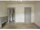 A bedroom with a grey built in dresser and doorway leading into another room at 1601 Dixie Hwy, Tarpon Springs, FL 34689