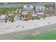 Aerial view showcasing beachfront condos with direct beach access to white sand beach at 19531 Gulf Blvd # 611, Indian Shores, FL 33785