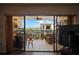 Relaxing balcony with tile floor, ceiling fan, and seating overlooking water at 19531 Gulf Blvd # 611, Indian Shores, FL 33785