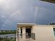 Relax on this balcony with scenic views of the water and the rainbow at 19531 Gulf Blvd # 611, Indian Shores, FL 33785
