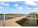 Well-maintained wooden dock with convenient boat slips and easy access to the open water at 19531 Gulf Blvd # 611, Indian Shores, FL 33785