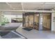 The entrance has a secure and inviting covered entrance with well-maintained landscaping and clear visibility to the reception area at 19531 Gulf Blvd # 611, Indian Shores, FL 33785