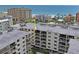 Exterior aerial view of building with balconies overlooking the ocean at 19531 Gulf Blvd # 611, Indian Shores, FL 33785