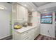 Kitchen area featuring custom cabinets, granite counters, stainless appliances, and modern fixtures at 19531 Gulf Blvd # 611, Indian Shores, FL 33785