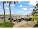 Picnic tables and barbecue available near boat docks, creating a pleasant outdoor dining space at 19531 Gulf Blvd # 611, Indian Shores, FL 33785