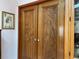 Custom wood paneled doors with unique carvings and beautiful crystal doorknobs at 20971 Negril Ct, Lutz, FL 33558