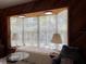 Relaxing window seat with plush cushions, offering natural light and scenic views at 20971 Negril Ct, Lutz, FL 33558