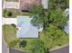 Aerial view of home showing roof, surrounding trees and property lines at 2183 Westchester Blvd, Spring Hill, FL 34606