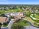 Aerial view of Timber Pines clubhouse, community pool, and golf course at 2183 Westchester Blvd, Spring Hill, FL 34606