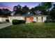 Charming single-story home with a well-manicured lawn and a two-car garage at 2183 Westchester Blvd, Spring Hill, FL 34606