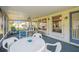 Spacious lanai with multiple seating areas, perfect for outdoor entertaining at 2183 Westchester Blvd, Spring Hill, FL 34606