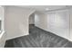 Finished basement featuring gray carpet and a closet at 2202 Amity Ct, New Port Richey, FL 34655