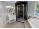 Modern bathroom with glass shower, soaking tub and vanity at 2202 Amity Ct, New Port Richey, FL 34655
