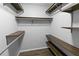 Spacious walk-in closet with custom shelving and racks for maximum storage and organization at 2202 Amity Ct, New Port Richey, FL 34655