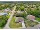This is an aerial view of a single Gathering home in a quiet neighborhood at 2251 Evenglow Ave, Spring Hill, FL 34609