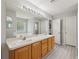 Bathroom with double sink and lots of natural light at 2251 Evenglow Ave, Spring Hill, FL 34609
