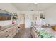 A bedroom with shelves, closet, and a large mirror at 2251 Evenglow Ave, Spring Hill, FL 34609
