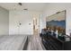 This bedroom has a large TV mounted to the wall at 2251 Evenglow Ave, Spring Hill, FL 34609