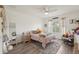 Cozy bedroom with a throw rug and chair with pillows at 2251 Evenglow Ave, Spring Hill, FL 34609