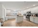 Spacious kitchen with an island, stainless steel appliances, and plenty of cabinet space at 2251 Evenglow Ave, Spring Hill, FL 34609