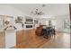 Bright living room featuring an electric fireplace, and open layout, and cozy seating, perfect for entertaining at 2251 Evenglow Ave, Spring Hill, FL 34609